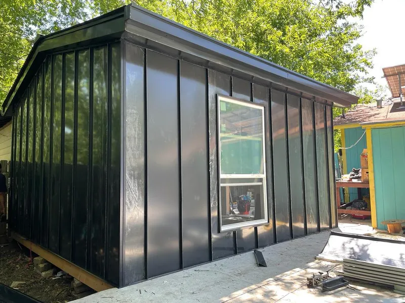 Black standing seam metal wall panels for Roof Inspection in Buckhall